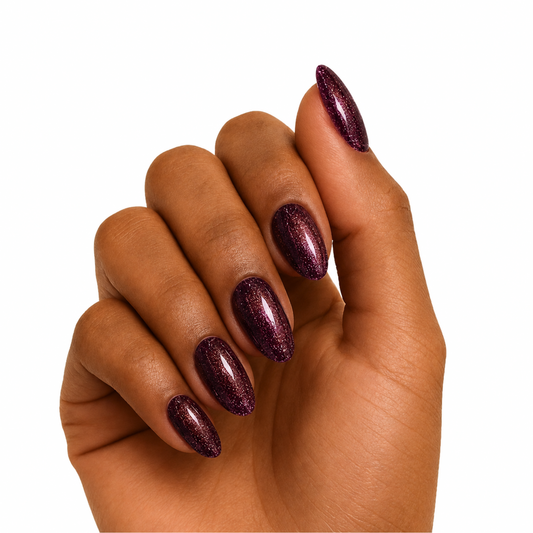 Deep plum shimmer semi-cured gel nail wraps on almond-shaped nails, glossy finish