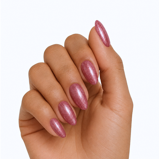 Rose pink shimmer semi-cured gel nail wraps on almond-shaped nails