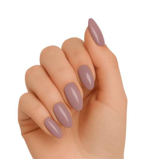 Glossy mauve gel nail wraps on hand showing neutral nude at-home manicure