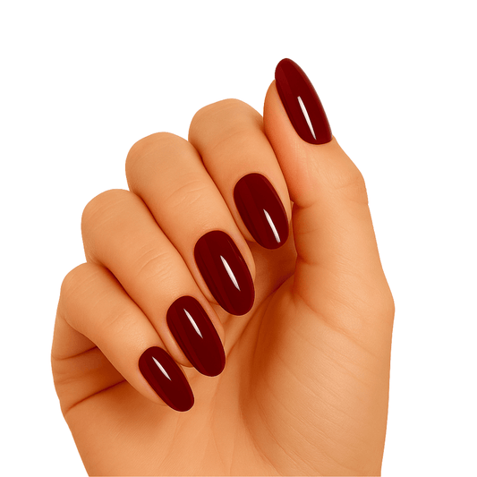Wine burgundy gel nail wraps on hand showing deep red glossy manicure finish