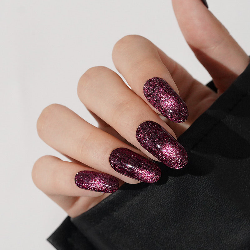 Deep magenta glitter semi-cured gel nail wraps with sparkling shimmer finish, almond shape