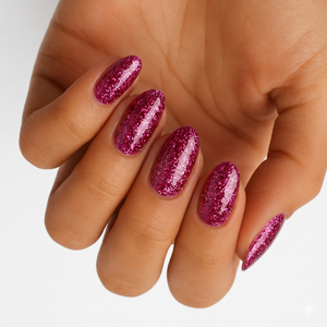 Magenta pink glitter semi-cured gel nail wraps on almond-shaped nails.