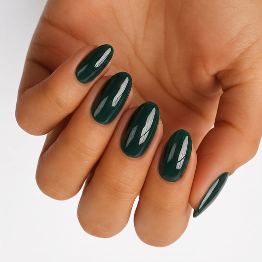 Dark forest green glossy semi-cured gel nail wraps, solid colour, almond shape