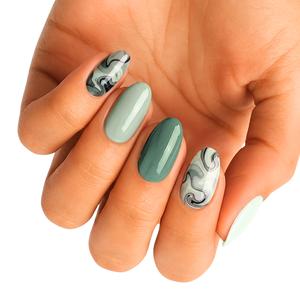 Sage and forest green semi-cured gel nail wraps with abstract swirl marble accents.