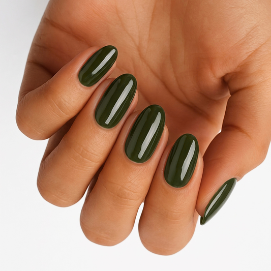 Glossy dark olive green nail wraps on an oval almond-shaped manicure