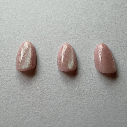 Mauve pink shimmer press-on nails, short round shape, glossy finish