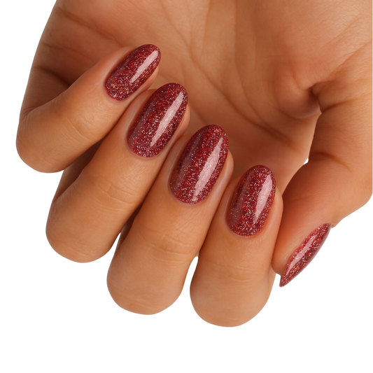 Glossy dark red glitter semi-cured gel nail wraps on oval-shaped nails