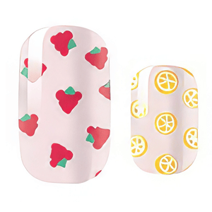 Tutti frutti kids nail wraps with strawberry and lemon patterns on pink base