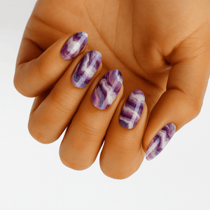 Wide fit purple marble nail wraps on hand displaying amethyst stone pattern