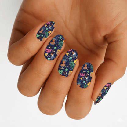 Colourful carnival nail wraps with geometric patterns on hand showing vibrant at-home manicure