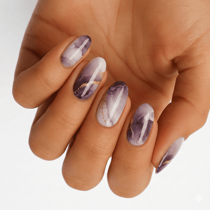 Purple marble effect gel nail wraps on hand showing glossy gradient manicure design