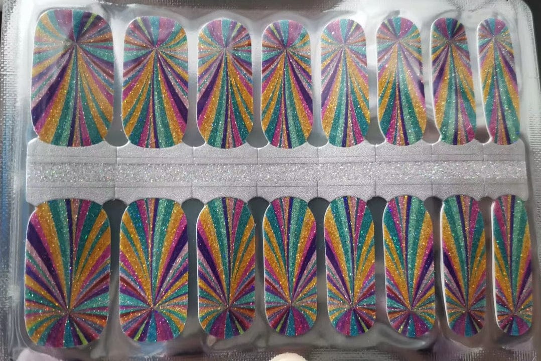 Holographic rainbow nail wraps sheet showing vibrant multicoloured sunburst pattern gel nail wrap strips
