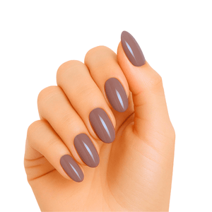 Smoked taupe brown gel nail wraps on hand showing elegant minimalist manicure