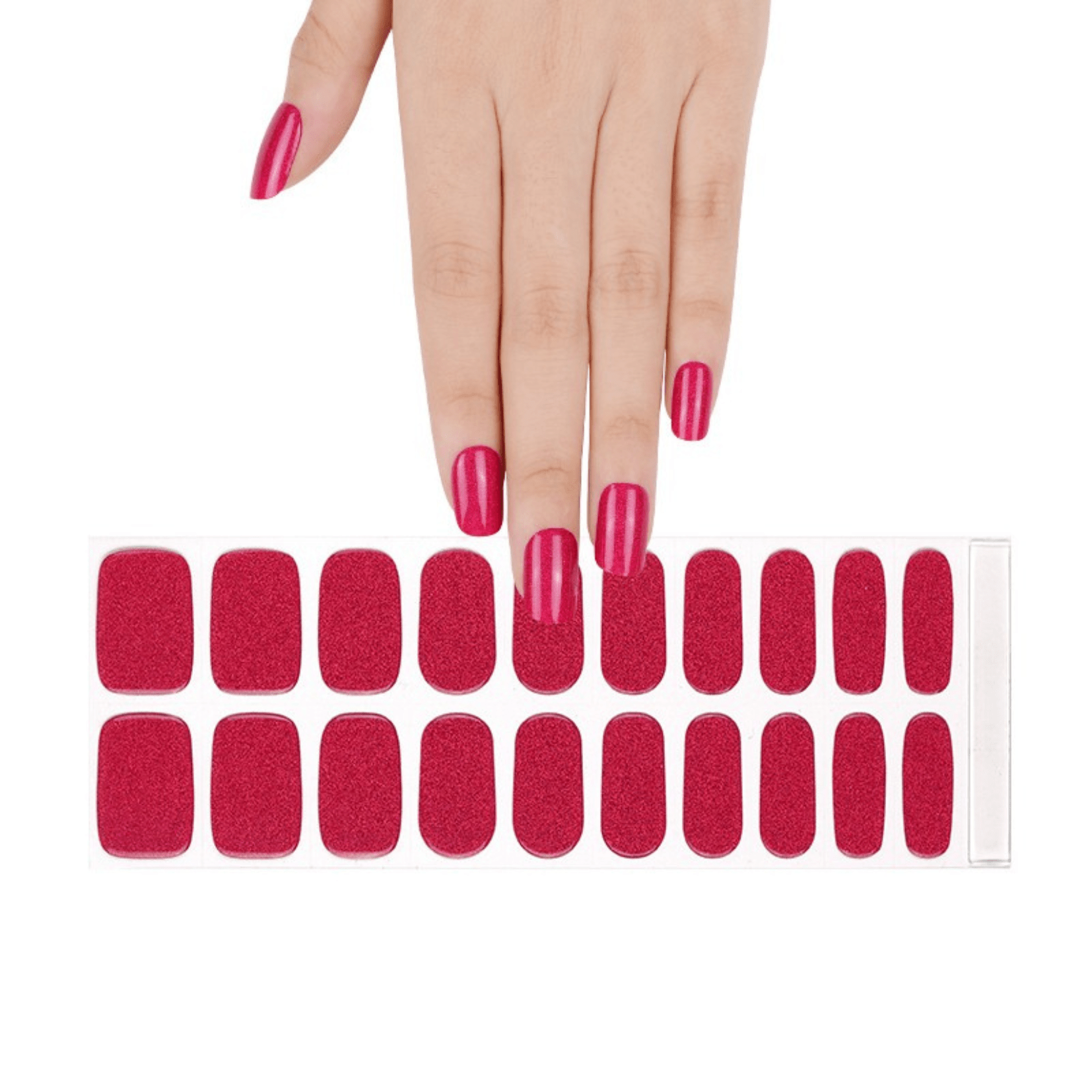 Deep magenta gel nail wraps with glitter finish on hand displaying glamorous at-home manicure